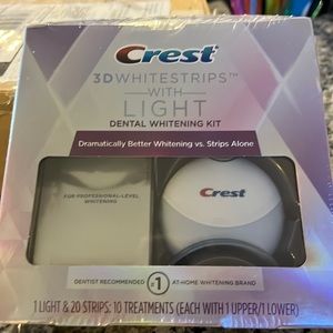 NWT still in packaging wrap- crest 3D white strips with light.